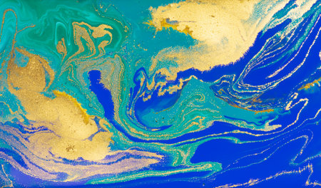 Blue and Golden Dust Placer on Liquid Blue Ink Background.の写真素材