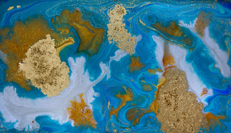 Golden Dust on Liquid Blue Ink Wave Background.の写真素材