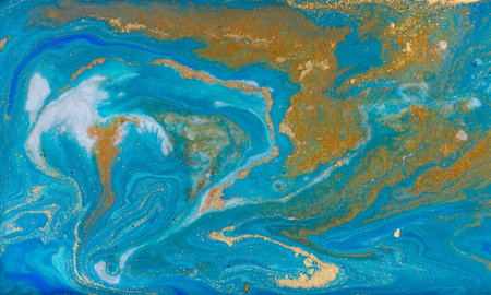Liquid Flow of Gold and Blue Paint Patternの写真素材