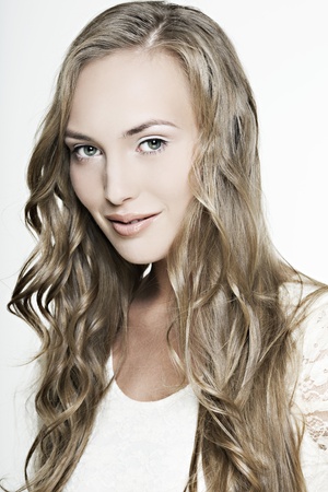 beautiful smiling girl with long wonderful hairの写真素材