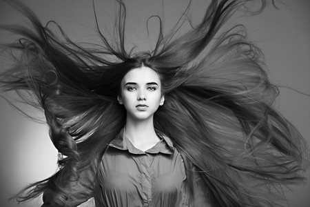 beautiful girl with perfect skin and long hair, developingの写真素材