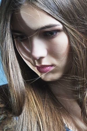 beautiful girl with perfect skin and long hairの写真素材