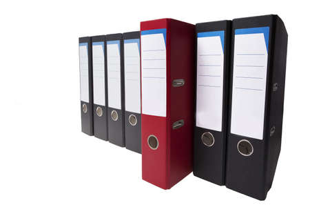 a red ringbinder stands out, it different than the usualの写真素材