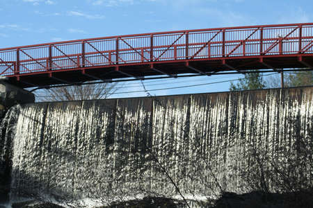Footbridge crossing Spicket River in Methuen, Maの写真素材