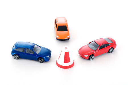 three colorful toy cars
