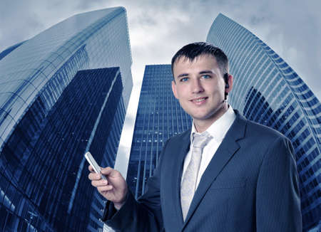 Young businessmen with phone の写真素材