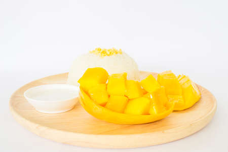 sweet sticky rice with mango on wood plate