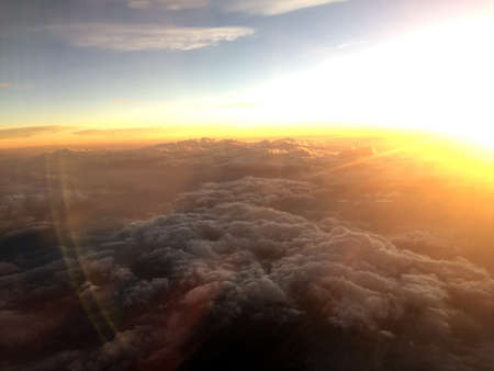 Aerial view see golden sunlight and the clouds