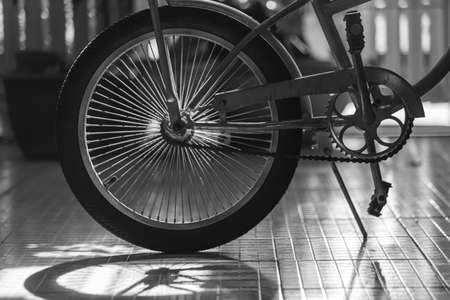 side view old bicycle wheel texture vintage style,whole front black and white memento memory of old...