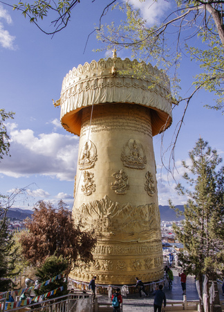 Tibet prayer wheel in the old town of Dukezong, Shangri La, Yunnan, Chinaのeditorial素材