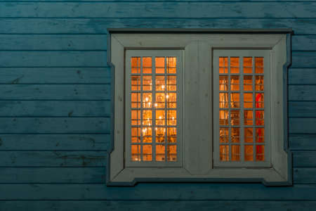 Orthodox wooden window. Poland. Orthodox window by night.の写真素材