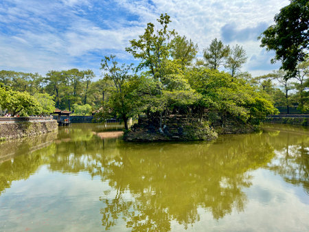 Coconut palm trees along the river in the Bay Mau Coconut Forest, Quang Nam, Vietnamの写真素材