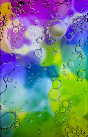 Abstract colorful background. Blurred colored drawing. Bubbles on a cheerful background.の写真素材
