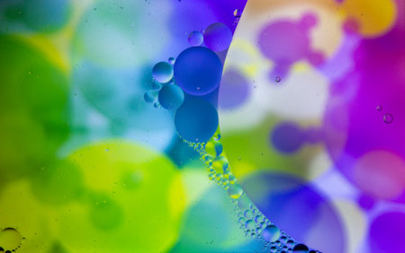 Abstract colorful background. Blurred colored drawing. Bubbles on a cheerful background.の写真素材