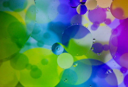 Abstract colorful background. Blurred colored drawing. Bubbles on a cheerful background.の写真素材