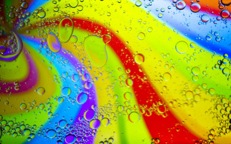 Abstract colorful background. Blurred colored drawing. Bubbles on a cheerful background.の写真素材