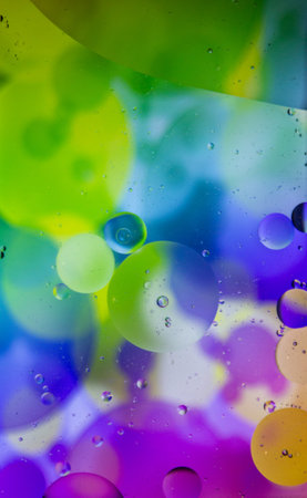 Abstract colorful background. Blurred colored drawing. Bubbles on a cheerful background.の写真素材