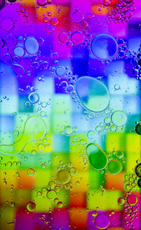Abstract colorful background. Blurred colored drawing. Bubbles on a cheerful background.の写真素材