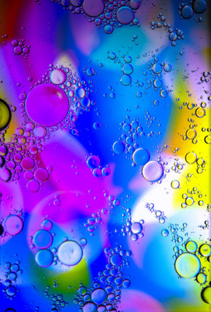 Abstract colorful background. Blurred colored drawing. Bubbles on a cheerful background.の写真素材