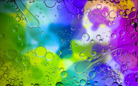Abstract colorful background. Blurred colored drawing. Bubbles on a cheerful background.の写真素材