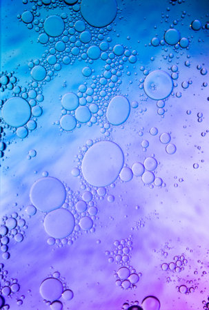 Abstract colorful background. Blurred colored drawing. Bubbles on a cheerful background.の写真素材