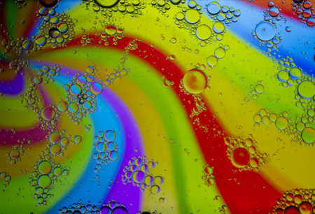 Abstract colorful background. Blurred colored drawing. Bubbles on a cheerful background.の写真素材