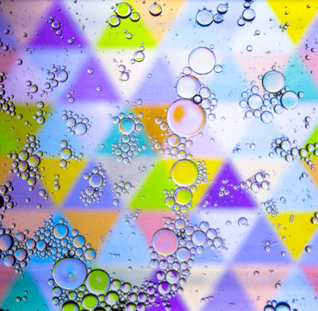 Abstract colorful background. Blurred colored drawing. Bubbles on a cheerful background.の写真素材