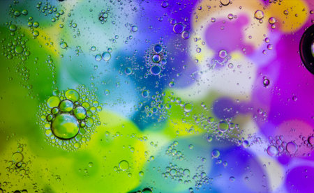 Abstract colorful background. Blurred colored drawing. Bubbles on a cheerful background.の写真素材