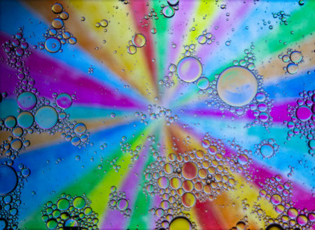 Abstract colorful background. Blurred colored drawing. Bubbles on a cheerful background.の写真素材