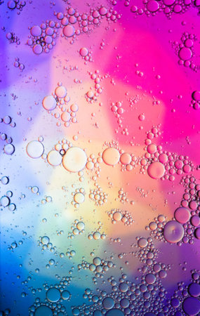 Abstract colorful background. Blurred colored drawing. Bubbles on a cheerful background.の写真素材