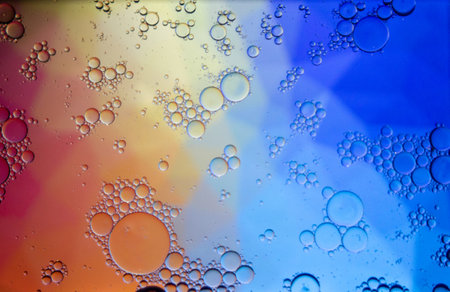 Abstract colorful background. Blurred colored drawing. Bubbles on a cheerful background.の写真素材