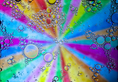 Abstract colorful background. Blurred colored drawing. Bubbles on a cheerful background.の写真素材