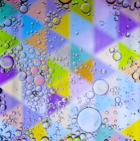 Abstract colorful Background Oil in Water surface Foam of Soap with Bubbles macro shot close-up.Image of oil drop on water for modern and creation design background.の写真素材