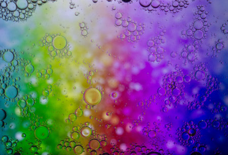 Abstract colorful Background Oil in Water surface Foam of Soap with Bubbles macro shot close-up.Image of oil drop on water for modern and creation design background.の写真素材