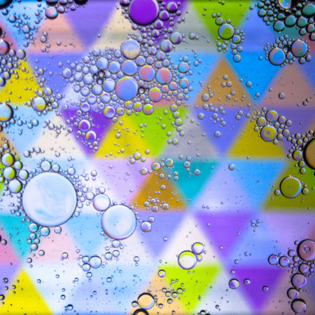 Abstract colorful Background Oil in Water surface Foam of Soap with Bubbles macro shot close-up.Image of oil drop on water for modern and creation design background.の写真素材