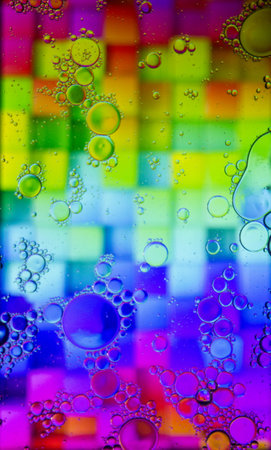 Abstract colorful Background Oil in Water surface Foam of Soap with Bubbles macro shot close-up.Image of oil drop on water for modern and creation design background.の写真素材