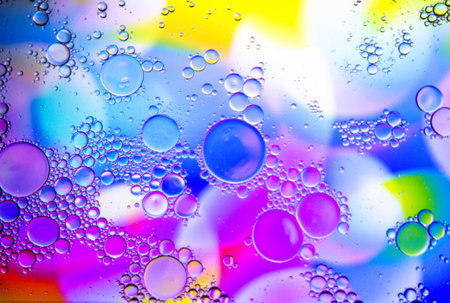 Abstract colorful Background Oil in Water surface Foam of Soap with Bubbles macro shot close-up.Image of oil drop on water for modern and creation design background.の写真素材
