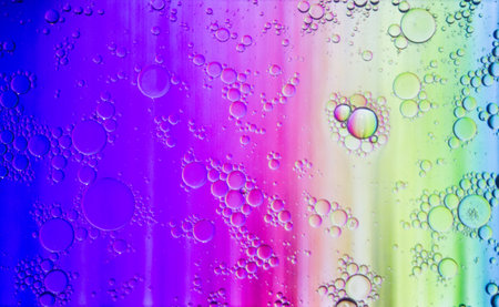 Abstract colorful Background Oil in Water surface Foam of Soap with Bubbles macro shot close-up.Image of oil drop on water for modern and creation design background.の写真素材