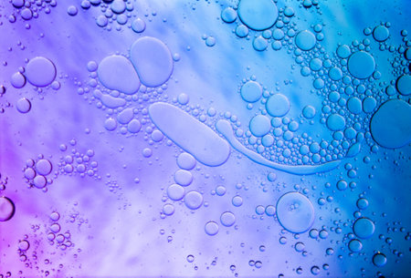 Abstract colorful Background Oil in Water surface Foam of Soap with Bubbles macro shot close-up.Image of oil drop on water for modern and creation design background.の写真素材