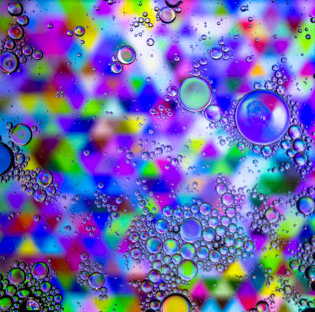 Abstract colorful Background Oil in Water surface Foam of Soap with Bubbles macro shot close-up.Image of oil drop on water for modern and creation design background.の写真素材