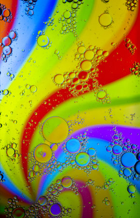 Abstract colorful Background Oil in Water surface Foam of Soap with Bubbles macro shot close-up.Image of oil drop on water for modern and creation design background.の写真素材