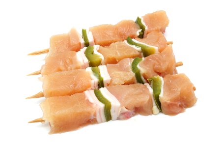 raw chicken skewers with paprikaの写真素材