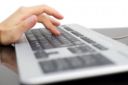 finger pressing "Y" key on keyboardの写真素材