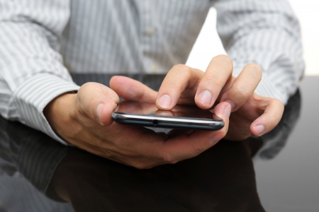 businessman working with mobile phoneの写真素材