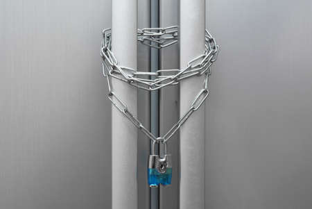 Dieting concept. Refrigerator, chain and lockの写真素材