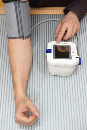 Checking blood pressureの写真素材