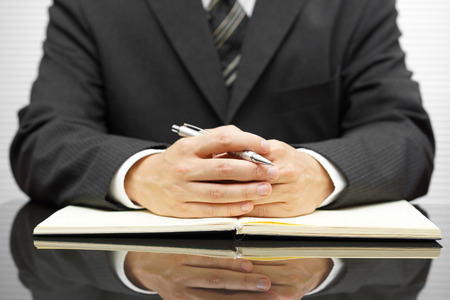 Accountant listening his clientの写真素材