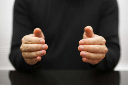 man hands in protection shapeの写真素材