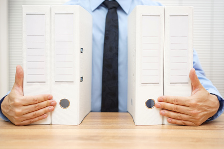 businessman holding company documentation, accounting conceptの写真素材