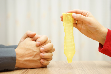 girlfriend found used condom and want an explanation from boyfriendの写真素材